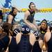 Michigan junior Lauren Dudley smiles as the team huddles together before the game against Indiana on Saturday, April 27. Daniel Brenner I AnnArbor.com
